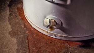Leaking and rusted hot water storage tank