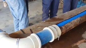 Damaged drain pipe repaired using pipe relining