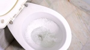 Running toilet requiring plumbing repair